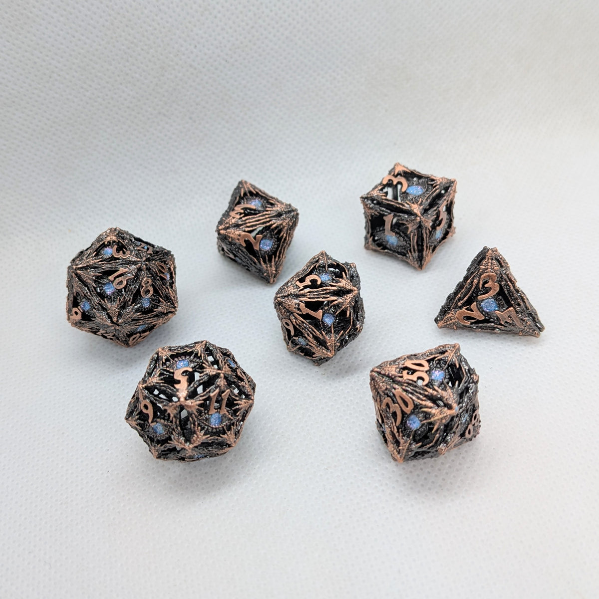 Dés en métal creux : Yeux du Diable - Bronze